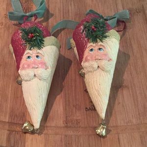 2 hanging Santa cone ornaments.